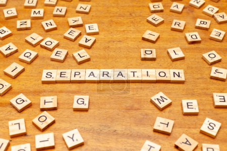 separation letters on wooden background