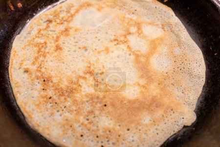 pancake fried in frying pan