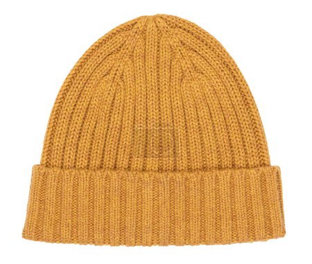 Photo for Orange knitted winter bobble hat of traditional design flat lay isolated on white background - Royalty Free Image