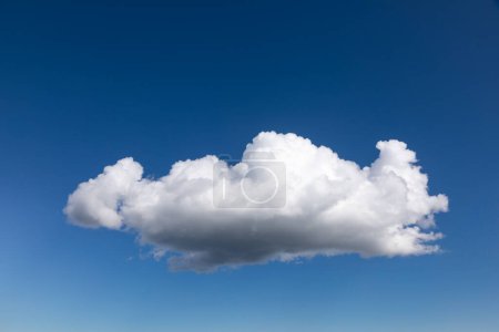 Photo for Blue summer sky with single cumulus cloud natural background with copy space - Royalty Free Image