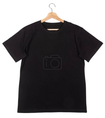 Photo for Plain black shortsleeve cotton T-Shirt with wooden hanger lay on a white background isolated - Royalty Free Image