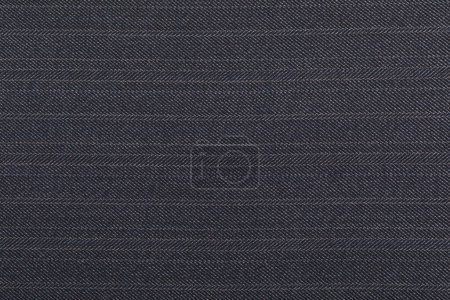 Photo for Blue woolen suit fabric woven in a herringbone pattern textured background - Royalty Free Image