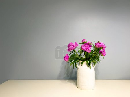Elegant Bouquet of Pink Peonies in White Ceramic Vase