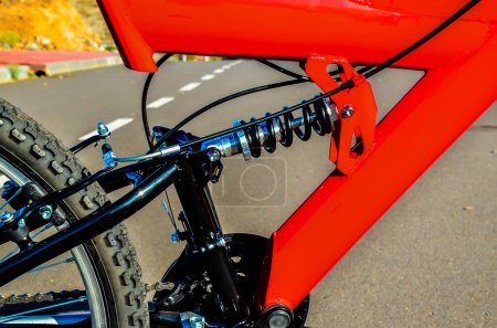 Close up of Modern Red Full Suspension Mountain Bike MTB Bicycle