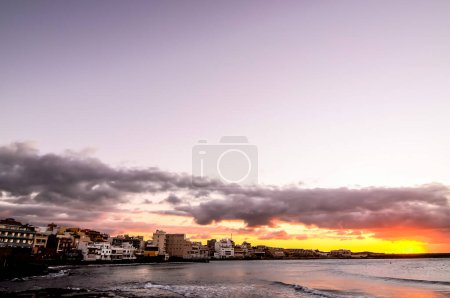 Sea and Building at Sunset in El Medano Tenerife Canary Islands