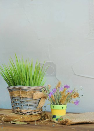 Photo for Rural still life template with meadow flowers in vases with empty place for text on a backdrop - Royalty Free Image