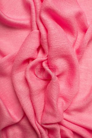 Foto de Pink soft fabric shaped as female genital organs, vulva and labia, vagina concept. High quality photo - Imagen libre de derechos