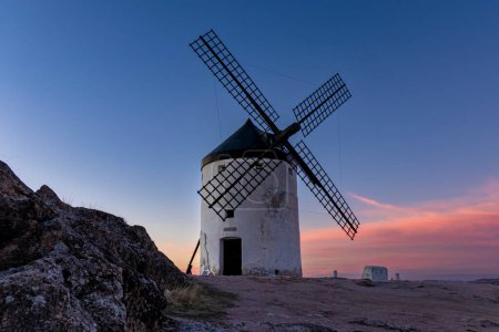 Captivating Views of the Consuegra Windmills in the Golden Hour