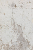 Stucco white aged background. Fragment of a wall in the old town. Vertical Poster #656746034