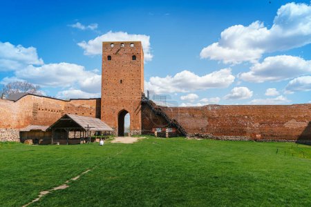Photo for Castle in Czersk, Poland. View of the Gate Tower. Medieval red brick castle. Residence of the Dukes of Mazovia - Royalty Free Image