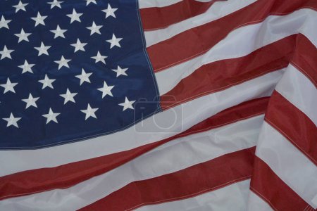 USA Flag.  USA flag background. Stars displaying on waving American flag in filled frame layout.