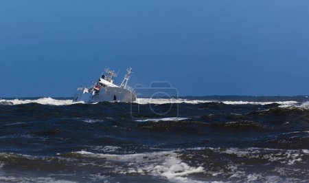 Photo for Skeleton coast, Namibia - August 10, 2018: shipwreck of Japanese registered fishing vessel, MVF Fukuseki Maru - Royalty Free Image