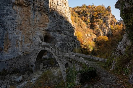 Photo for View of the traditional stone Kokkorou Bridge in Epirus, Greece in Autum - Royalty Free Image