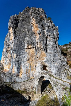 Photo for View of the traditional stone Kokkorou Bridge in Epirus, Greece in Autum - Royalty Free Image