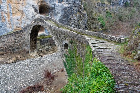 Photo for View of the traditional stone Kokkorou bridge near the village of Kipi in Zagori of Epirus, Greec - Royalty Free Image