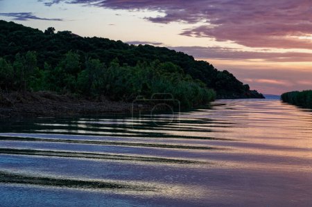 View of the river mouth of Acheron River near the village of Ammoudia in Epirus, Greece at sunset