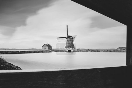 Windmill on wadden sea island Texel belonging to the Nehterlands, Europe, tourism landmark in its landscape