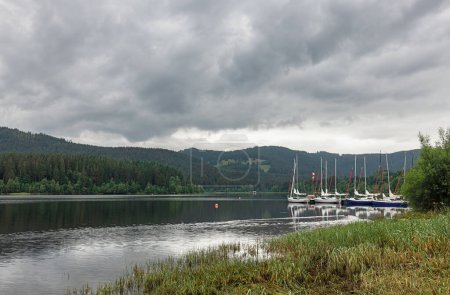 Photo for Landscape with boats on the lake Schluchsee - Royalty Free Image