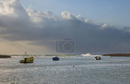 beautiful seascape with boats on Hof Dor at sunset in Israel