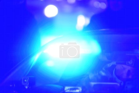 Photo for Police car with blue light on the street at night, selective focus - Royalty Free Image