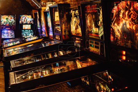 Photo for Krakow, Poland - November 17, 2023: Pinball machines in a basement - Royalty Free Image