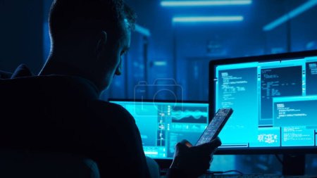 Photo for Computer Hacker in Hoodie. Obscured Dark Face. Hacker Attack, Virus Infected Software, Dark Web and Cyber Security concept. - Royalty Free Image