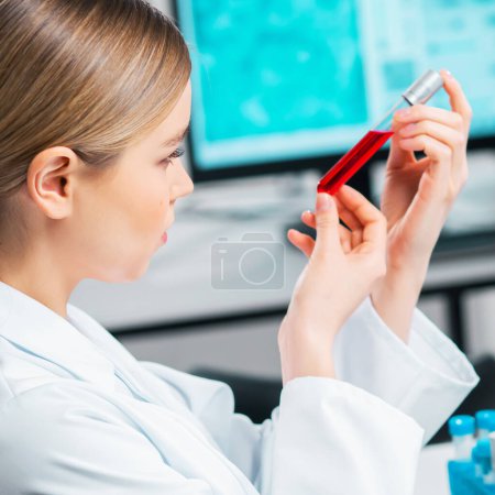 Photo for Professional scientist working on a vaccine in a modern scientific research laboratory. Genetic engineer workplace. Laboratory tools: microscope, test tubes, equipment. Future technology, healthcare and science concept. - Royalty Free Image