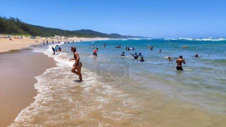 Photo for Cape Vidal, South Africa - 14 January 2023: people on the beach of Cape Vidal in Isimangaliso park, South Africa - Royalty Free Image