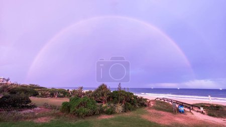 Photo for Rainbow at the beach of Jeffrey's bay on South Africa - Royalty Free Image