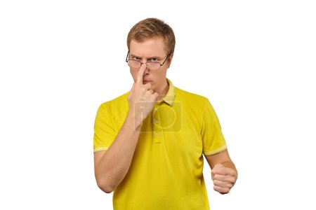 Photo for Unhappy geek in glasses and yellow T-shirt ready to fight with fists isolated on white background. Funny man ready to fight back offender, nerd guy with clenched fist, bullying defense - Royalty Free Image