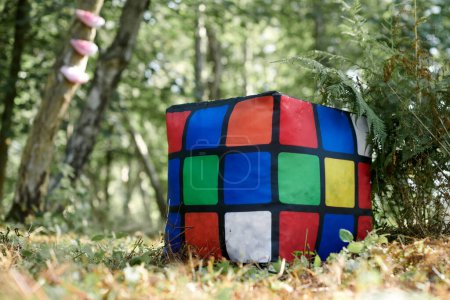 Photo for Svetlogorsk, Russia - 2022.08.13 - Big Rubik cube art object on green forest background at outdoor art exhibition, colorful magic cube as ecological concept about environmental protection - Royalty Free Image