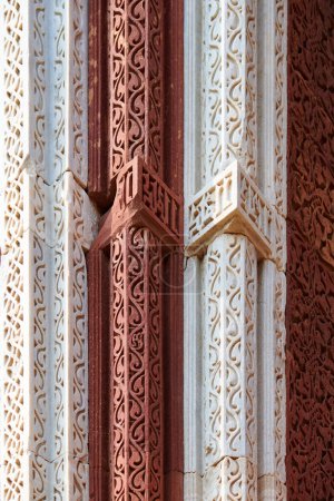 Photo for Wall decorative patterns of Qutb complex in South Delhi, India, close up ancient bas relief wall decorations of mosque ruins landmark, popular touristic spot in New Delhi, ancient indian architecture - Royalty Free Image