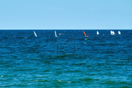 Blue sea sailing regatta, nautical spectacle sport sailing competition among yacht club participants symbolizing spirit of maritime sailing challenge, yacht racing hobby