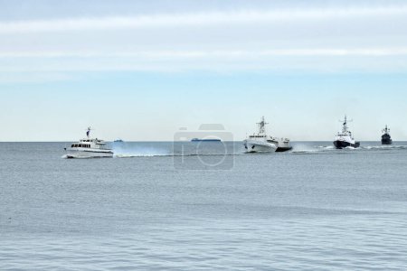 Photo for Flotilla of Russian warships sailing toward military target, armed warships ready for attack enemy performing strategic maneuver, Russian sea power deployment warships for tactical advantage - Royalty Free Image