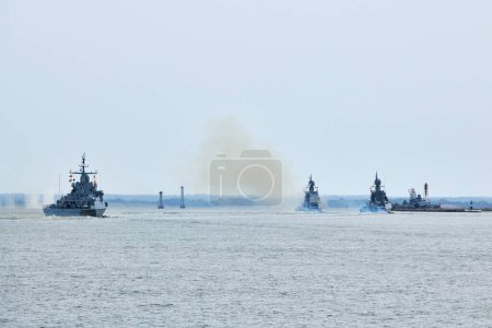 Photo for Flotilla of Russian warships sailing toward military target, armed warships ready for attack enemy performing strategic maneuver, Russian sea power deployment warships for tactical advantage - Royalty Free Image