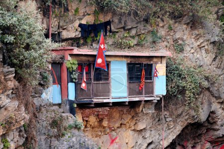 Vasuki meditation cave in Pashupatinath Temple in Kathmandu, Nepal, small ascetic building on slope of mountain, escape from external clamor in spiritual journeys for solace and enlightenment
