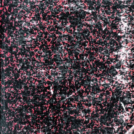 Foto de Textura que muestra una mezcla de negro y rojo rosado, que recuerda a una superficie de papel erosionada y erosionada. Papel de mármol vintage. El patrón abstracto emana un encanto artístico, rústico, ideal para fondos o expresiones artísticas. - Imagen libre de derechos