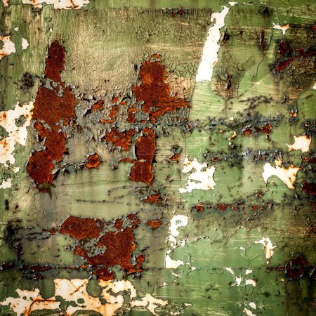 Grunge texture background overlay. A close-up view of a metal surface with weathered paint. The once-vibrant colors have faded, revealing patches of rust and wear. The texture is rough, with cracks and peeling paint. Ideal for industrial or grunge-th