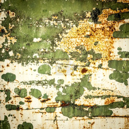 Grunge texture background overlay. A close-up view of a metal surface with weathered paint. The once-vibrant colors have faded, revealing patches of rust and wear. The texture is rough, with cracks and peeling paint. Ideal for industrial or grunge-th