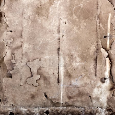 Foto de Antigua superficie de papel texturizado con arrugas y bordes rotos, exudando un ambiente histórico y antiguo. - Imagen libre de derechos