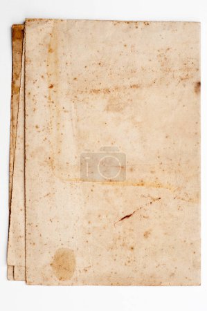 Foto de Primer plano de la página de papel envejecido y manchado de un libro antiguo, mostrando una rica textura ideal para un fondo vintage o contexto histórico. - Imagen libre de derechos