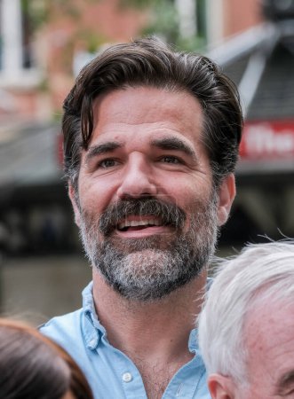 Photo for London, UK. American actor Rob Delaney at the Equity Union rally, Leicester Square, London, standing in solidarity with SAG-AFTRA actors strike in America, for fair pay, residual payments and issues on A.I. - Royalty Free Image