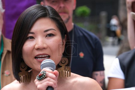 Photo for London, UK. Actor Rebecca Yeo at the Equity Union rally at Leicester Square, London, standing in solidarity with SAG-AFTRA actors strike in America, for fair pay, residual payments and issues on A.I. - Royalty Free Image