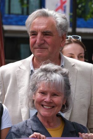 Photo for London, UK. 21st July 2023. Actors  Imelda Staunton and Jim Carter at the Equity Union rally, London, in solidarity with SAG-AFTRA  strike in USA, for fair pay, residual payments and A.I. issues. - Royalty Free Image