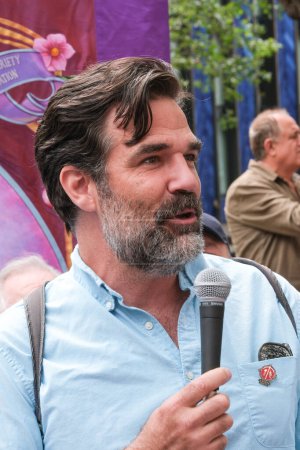 Photo for London, UK. 21st July 2023. Actor Rob Delaney at the Equity Union rally, London, standing in solidarity with SAG-AFTRA actors strike in America, for fair pay, residual payments and issues on A.I. - Royalty Free Image