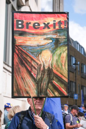 Photo for London, UK. 23rd September 2023. Pro-EU supporter holding protest sign at the anti-Brexit National Rejoin March rally in London, calling for the United Kingdom to rejoin the European Union. - Royalty Free Image