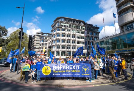 Photo for London, UK. 23rd September 2023. Pro-EU supporters holding large BIN BREXIT protest banner at the anti-Brexit National Rejoin March rally in London, calling for the United Kingdom to rejoin the European Union. - Royalty Free Image