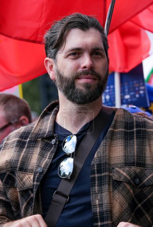 Photo for London, UK. 23rd September 2023. Pro-EU supporter Alex Kerr at the anti-Brexit National Rejoin March rally in London, calling for the United Kingdom to rejoin the European Union. - Royalty Free Image