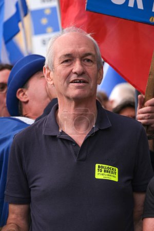 Photo for London, UK. 23rd September 2023. Pro-EU former MEP Richard Corbett sign at the anti-Brexit National Rejoin March rally in London, calling for the United Kingdom to rejoin the European Union. - Royalty Free Image