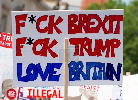 Photo for London, UK. 13th July 2018. One of the many hundreds of posters seen at the #BringTheNoise Women's March Anti Donald Trump protest demonstration through the streets of central London, UK. - Royalty Free Image